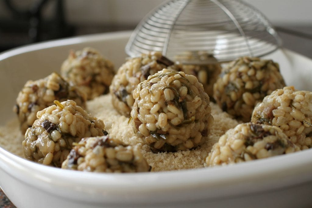 These Vegan Shiitake Mushroom Barley Arancini are a Japanese twist on an Italian favourite. This recipe uses nutritional yeast and seaweed to replicate the umami flavour of traditional Parmesan cheese. #barley #arancini #umami #appetizer #vegan #vegetarian