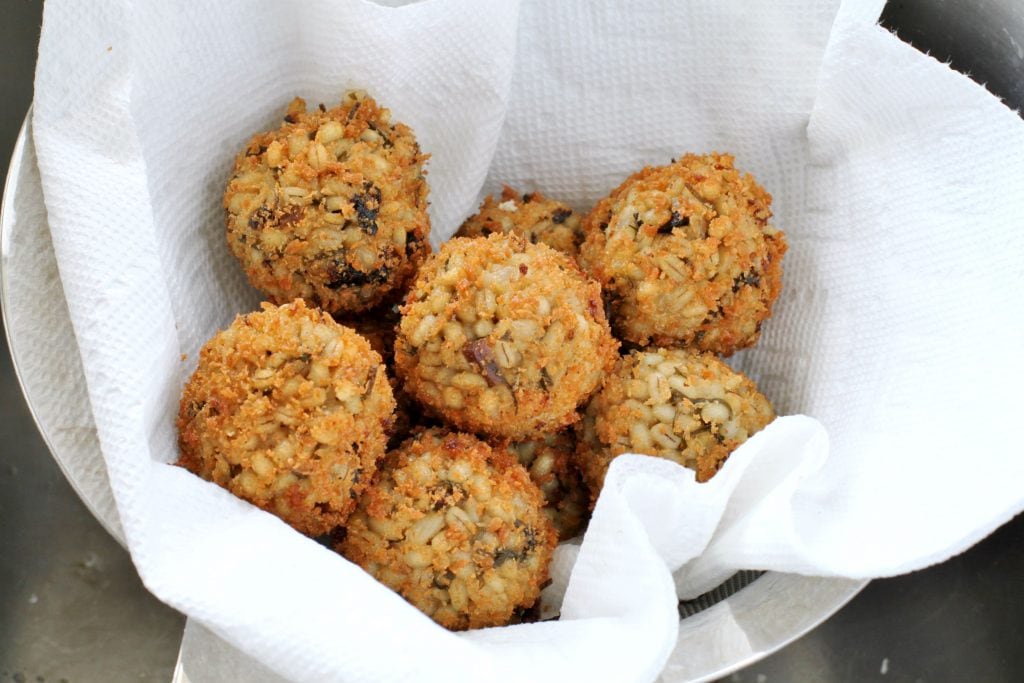 These Vegan Shiitake Mushroom Barley Arancini are a Japanese twist on an Italian favourite. This recipe uses nutritional yeast and seaweed to replicate the umami flavour of traditional Parmesan cheese. #barley #arancini #umami #appetizer #vegan #vegetarian