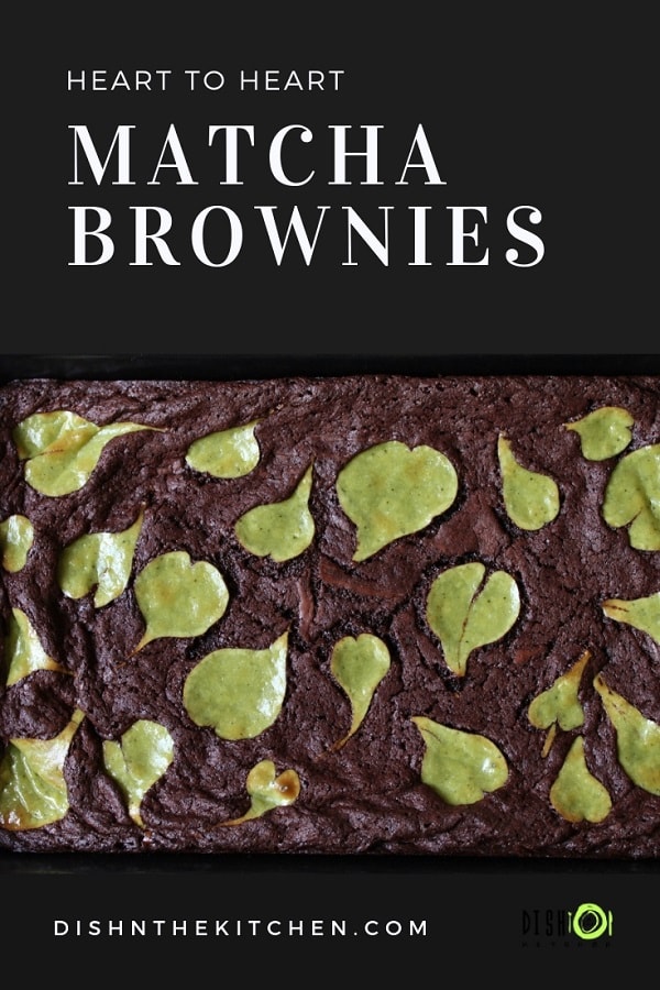 Decadent chocolate brownies topped with little matcha cheesecake hearts. Bake these Matcha Brownies today for someone you love. The best gifts are baked from the heart! #ValentinesDay #brownies #matchabrownies #baking 