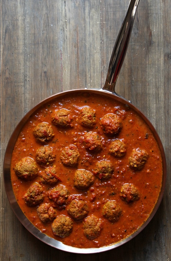 Rich and luxurious, here's a Butter Chicken recipe with a twist...it's in meatball form! Start with roasted spices and your mouth will thank you. #butterchicken #curry #meatballs #chickenmeatballs #garammasala #tandoorimasala #spices